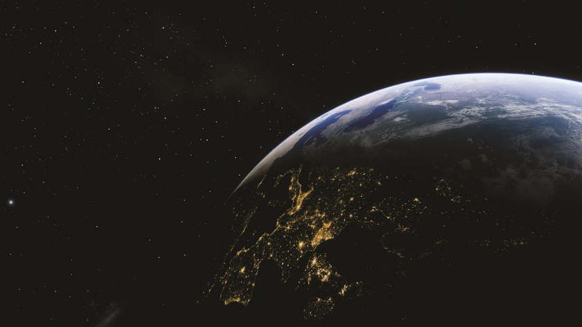 Looking down at Earth from outer space with city lights