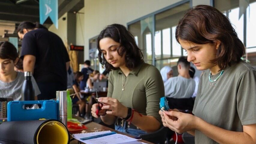 Group of 2 working on a Space Apps project