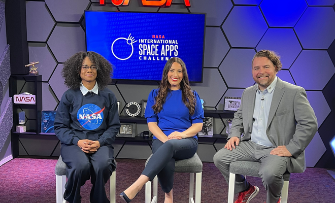 Denise Hill, Marie Mimiaga, Keith Gaddis sitting side by side at the NASA Goddard studio